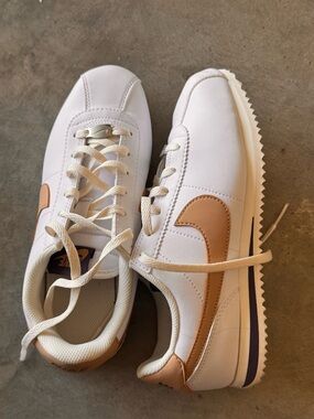 Nike White Sneakers with Tan Swoosh Accent